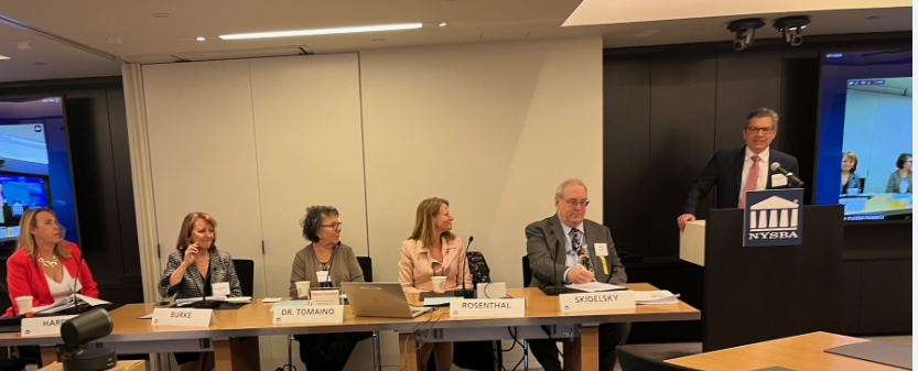 A panel of 4 women and 2 men